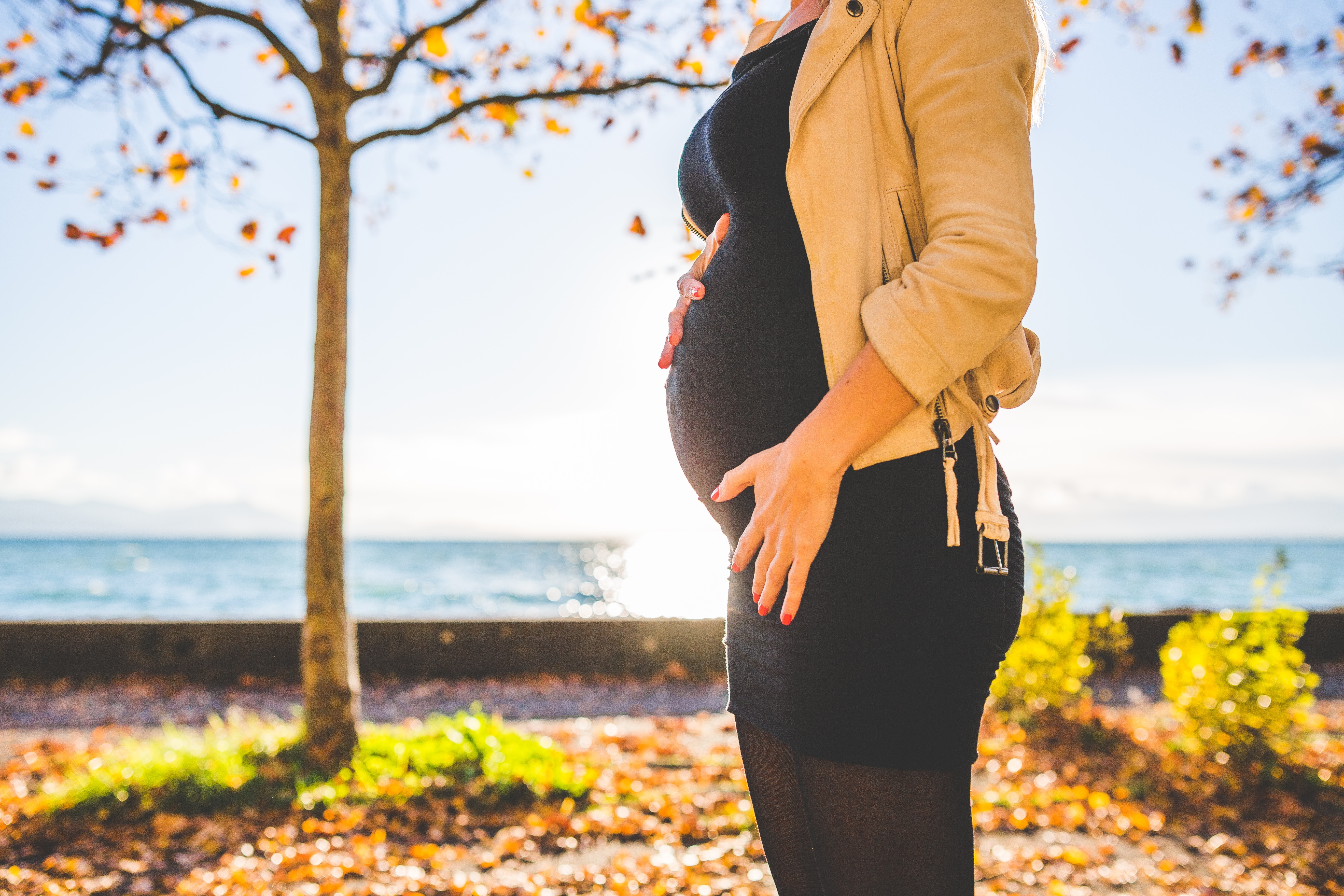 pregnant woman in the fall