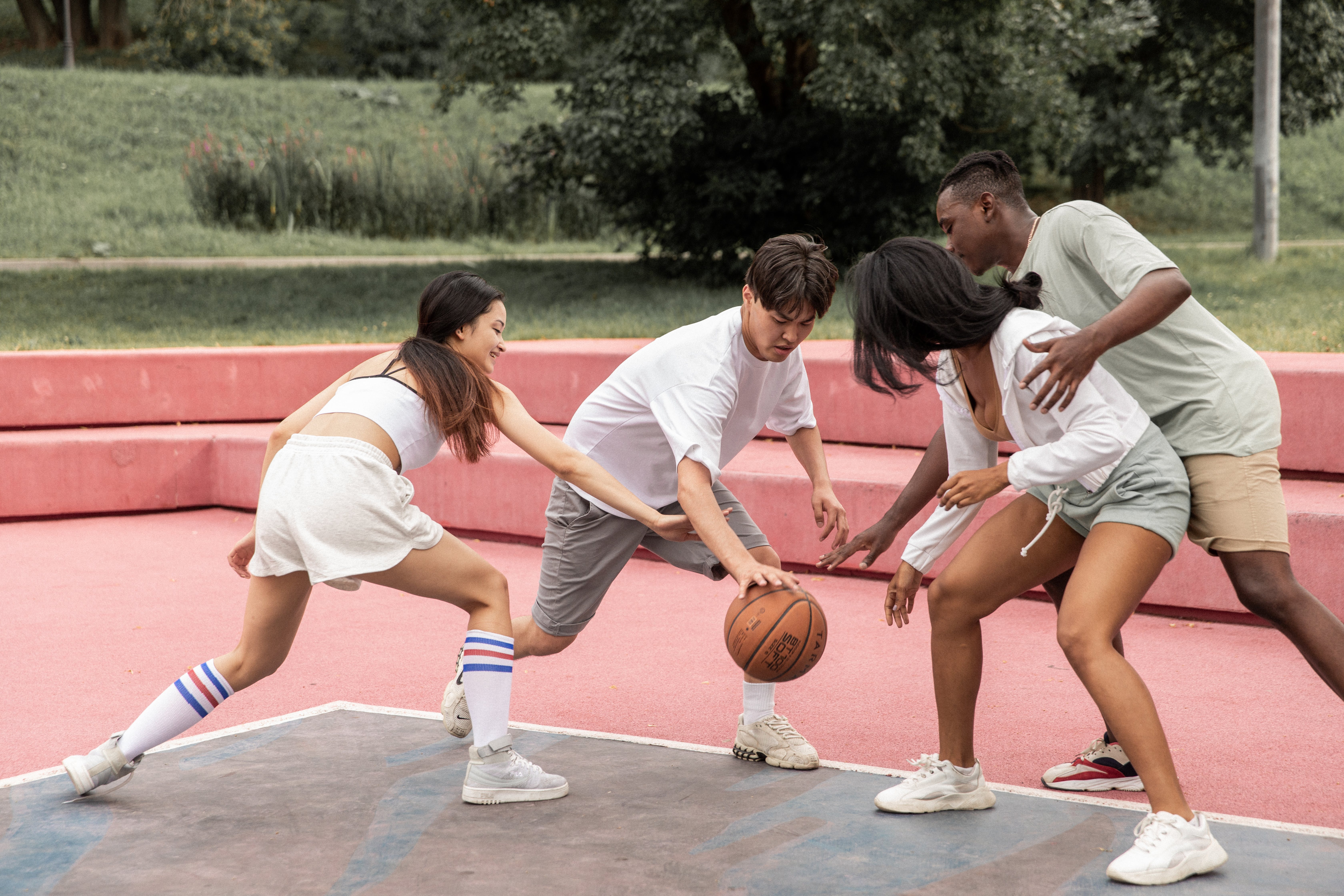 friends playing basketball